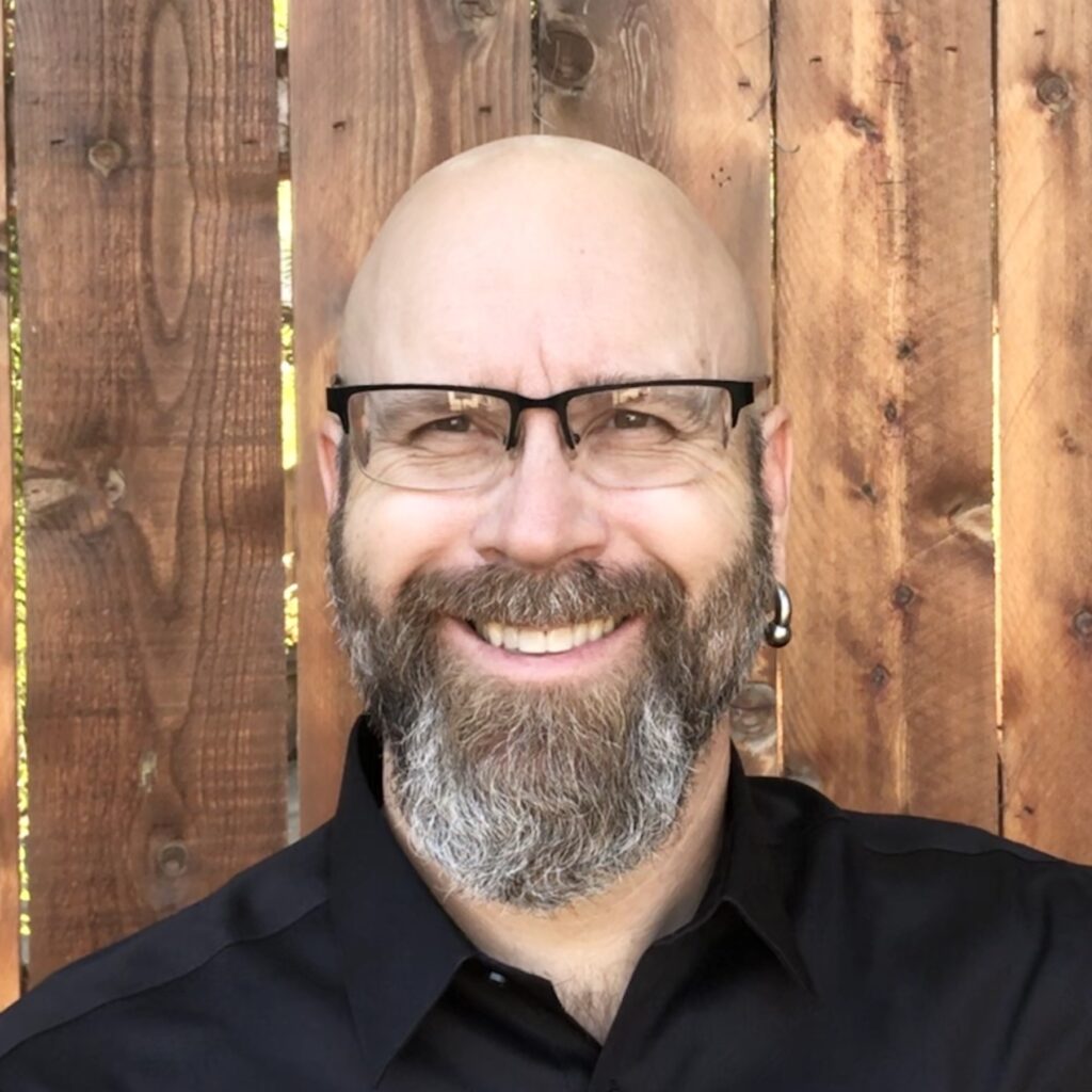 a headshot of Chuck Whitley